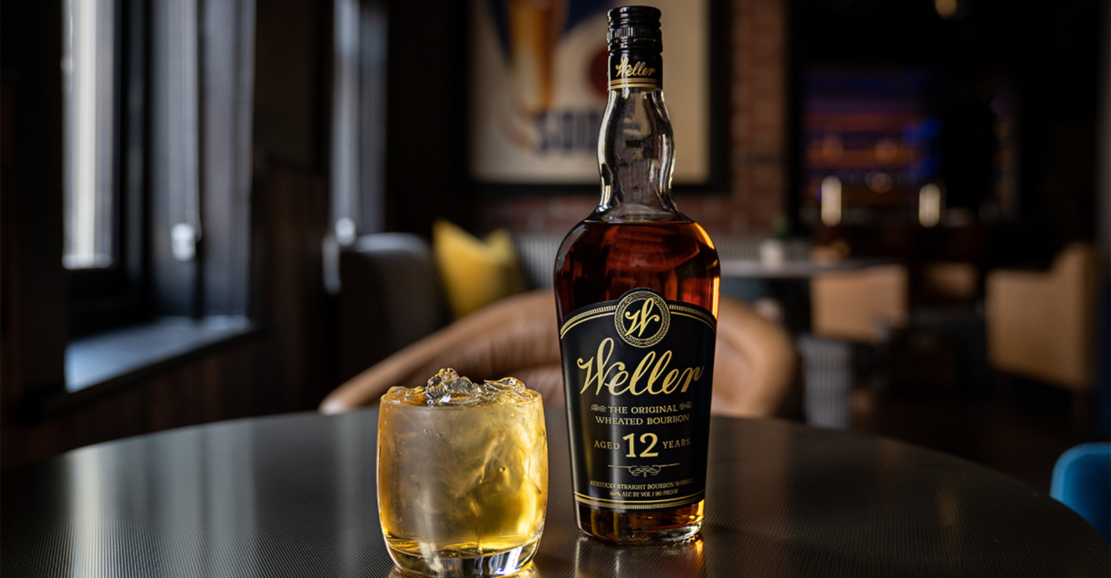 A Weller bourbon cocktail served on a dark timber bar